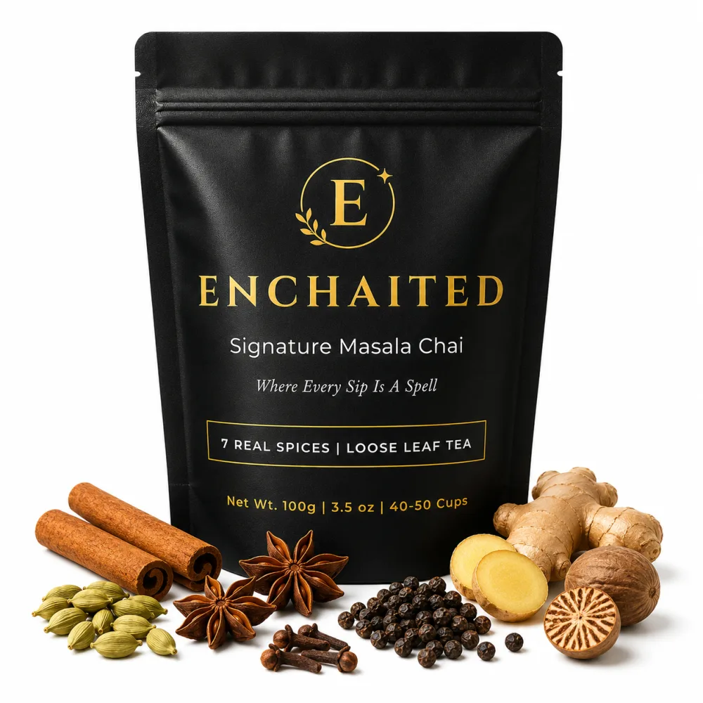 The seven whole spices in the Enchaited blend arranged around loose Assam tea